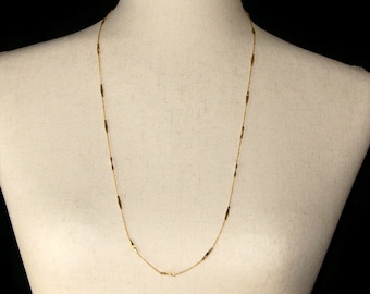 Vintage Gold Tone 29 Inch Necklace with Spring Ring Clasp.