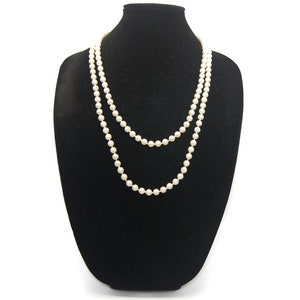 Vintage 55 Inch Individually Knotted 8mm Faux Pearls Necklace with Spring Ring Clasp.