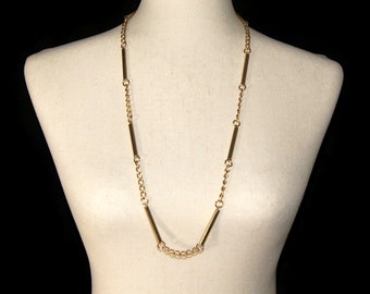 Vintage Gold Tone 32 Inch Chain Link Necklace with Short and Long Links and a Hook Clasp.