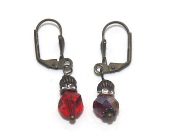 Vintage Brass Tone, Red Glass and Clear Rhinestones Dangle Earrings with Latch Backs for Pierced Ears.