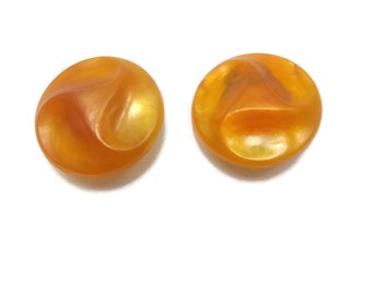 Vintage Translucent Orange Lucite Plastic Round Clip on Earrings. Marked Made in Western Germany.