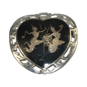 Vintage Siam Silver Nielloware Heart Brooch Depicting Mekkala Goddess of Lightning and Ramasoon God of Thunder.