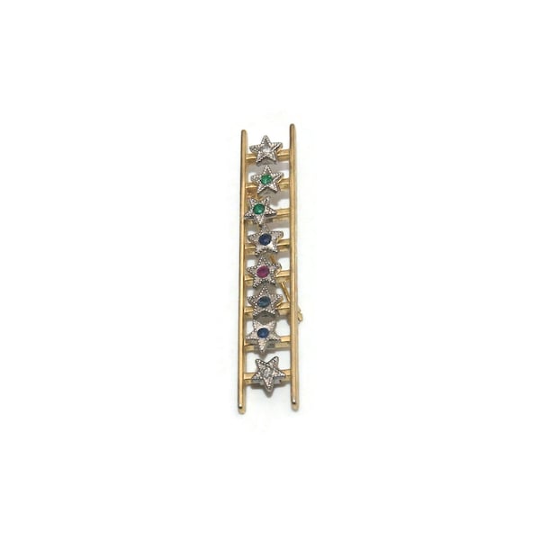 Vintage 1970s Mary Kay Ladder of Success Star Brooch with 8 Stars with Clear, Blue, Green and Pink Rhinestones.