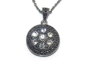 Vintage Silver Tone, Marcasite and Clear Rhinestones Round Pendant on 18 Inch Silver Tone Chain with Spring Ring Clasp.