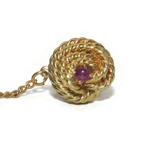 Vintage Gold Tone Coiled Knot and Round Garnet Tie Tack with Chain. image 2