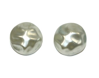 Vintage Round Silver Tone Plastic Clip on Earrings. Marked Hong Kong. Textured Button Style Earrings.