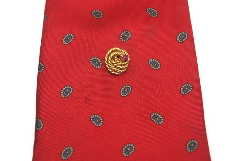 Vintage Gold Tone Coiled Knot and Round Garnet Tie Tack with Chain. image 1