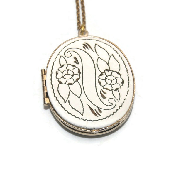 Vintage Gold Tone and White Enamel Oval Floral Design Locket on 36 Inch Chain with Spring Ring Clasp.