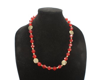 Vintage Gold Tone and Faceted Red Plastic Beaded 24 Inch Necklace with Magnetic Clasp.