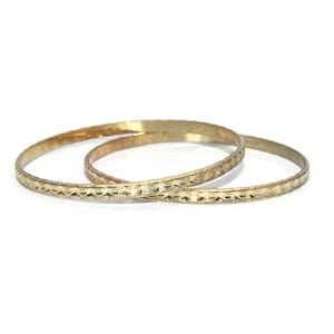 Matching Pair of Vintage Textured Gold Tone 8 1/2 Inch Bangle Bracelets.