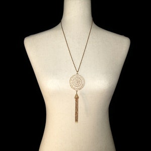 Vintage Gold Tone Fringed Pendant on 24 Gold Tone Chain with Spring Ring Clasp.
