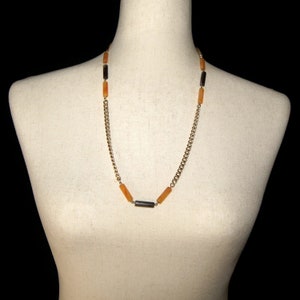 Vintage Emmons Gold Tone with Yellow and Brown Lucite Beads 26 Inch Necklace with Spring Ring Clasp. Emmons Hallmark Tag.