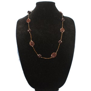 Vintage Brown Lucite and Glass Beaded Necklace with Gold Tone Lobster Claw Clasp.