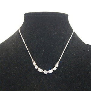 Vintage Avon Silver Tone and Clear Rhinestones 17 Inch Bib Necklace with Lobster Claw Clasp. Avon Hallmark Tag.