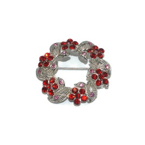 Vintage Silver Tone Christmas Wreath with Red and Pink Rhinestones.