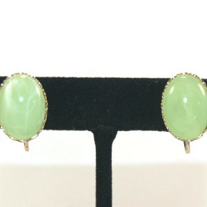 Vintage Gold Tone and Green Resin Oval Domed Clip on Earrings.