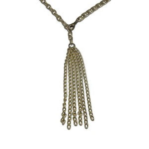 Vintage Gold Tone Fringed Pendant on 40 Inch Gold Tone Chain with Lobster Claw Clasp.