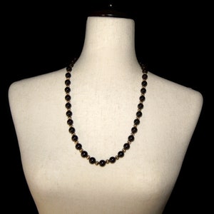 Vintage Gold Tone and Deep Brown Glass Beaded 26 Inch Necklace.