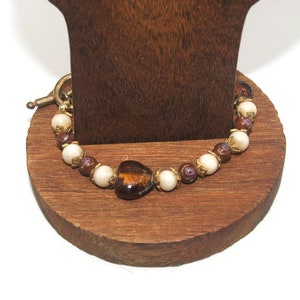 Vintage Gold Tone with Brown and White Lampwork Glass Beads 8 Inch Bracelet with Toggle Clasp.