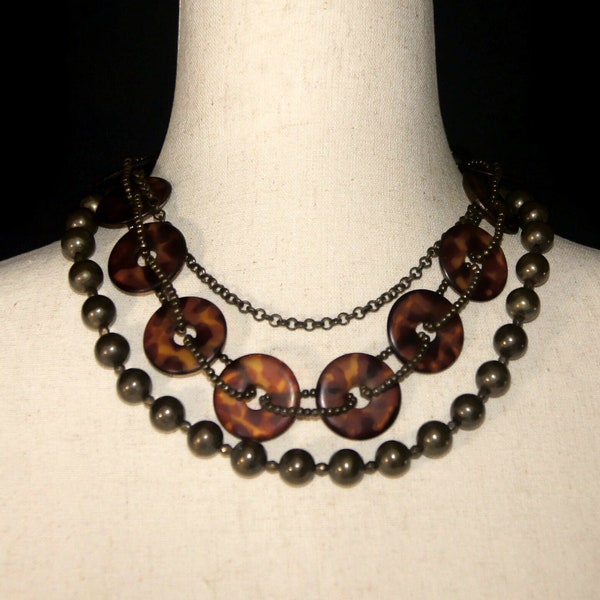 Vintage Premier Designs Brass Tone and Tortoise Shell Plastic 3 Strand 19 Inch Tiered Necklace with Toggle Clasp. Crown and PD Hallmark Tag.