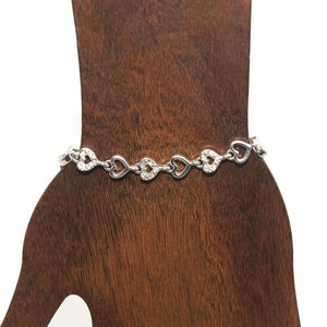 Vintage Silver Tone and Clear Rhinestones 8 Inch Heart Link Bracelet with Hinged Clip Clasp.