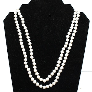 Vintage Gold Tone and Faceted Milk Glass Beaded 2-Strand Necklace with a Slide Box Clasp.