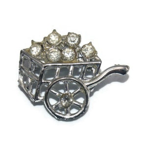 Vintage SilberFarbene und klare Strass Blumenwagen Brosche.