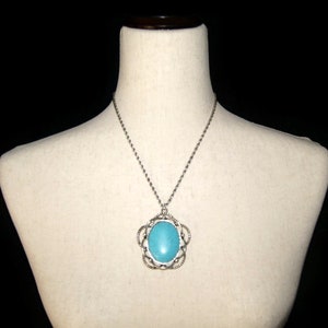 Large Vintage Silver Tone and Oval Faux Turquoise Pendant on 18 Inch Silver Tone Twisted Rope Chain with Lobster Claw Clasp.