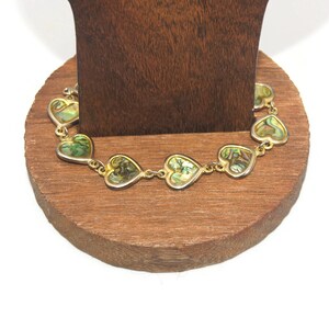 Vintage Gold Tone and Faux Abalone 7 Inch Heart Link Bracelet with Hinged Clip Clasp.