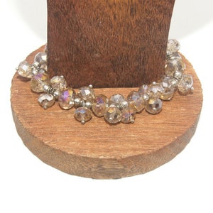 Vintage Silver Tone and Gold Tone Glass Beads 6 1/2 Inch Elastic Bracelet.