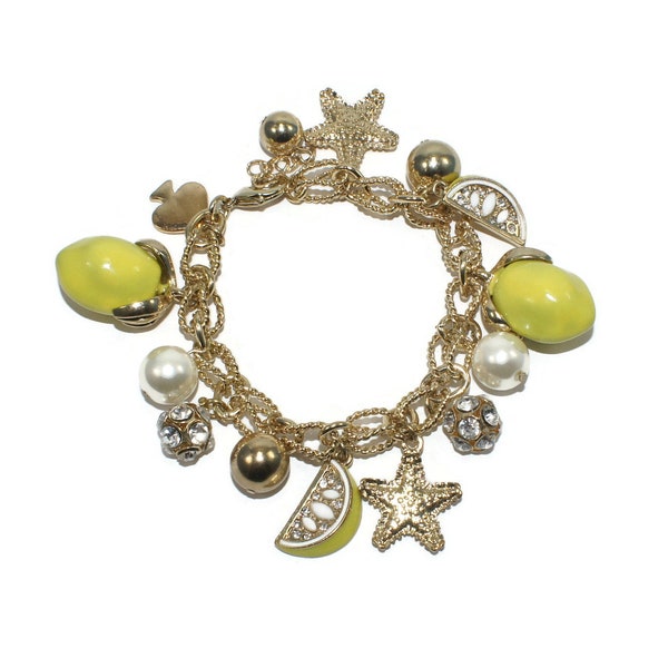 Vintage Gold Tone 7 1/2 Inch Charm Bracelet with Fruit, Starfish, Faux Pearl and More Charms. Lobster Claw Clasp.