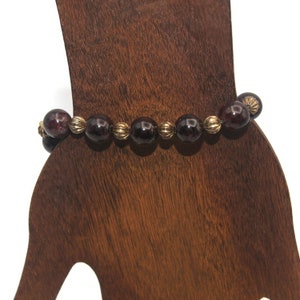 Vintage Purple Glass and Gold Tone Beaded 6 1/2 Inch Bracelet.