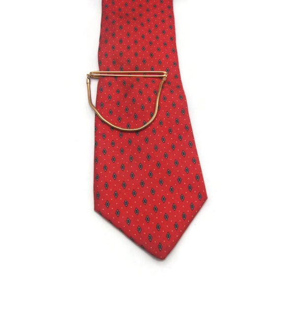 Pince à cravate vintage Swank bleu baguette strass ton argent
