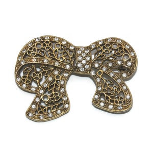 Vintage Gold Tone and Clear Rhinestones Bow Brooch.
