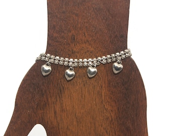 Vintage Silver Tone 8 1/2 to 11 Inch Adjustable Anklet with a 4 Dangling Heart Charms and Lobster Claw Clasp.