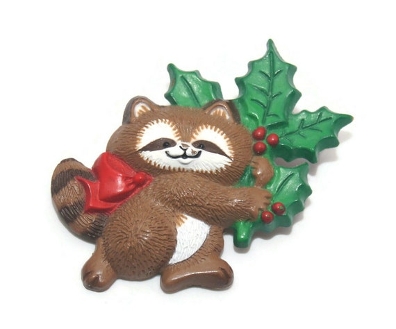 Vintage 1986 Hallmark Cards Christmas Racoon with Holly Brooch. 1986 Hallmark Cards Inc. Hallmark.