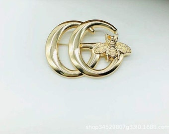 Gucci strawberry brooch deals