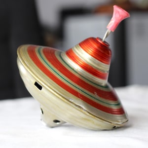 Vintage Tin Spinning Top: 70s Push Toy, Colorful Circle Design