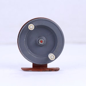 Vintage Metal Fishing Reel: Mid-Century Retro Decor
