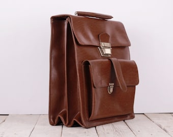 Bolso escolar vintage de los años 70 con asa superior
