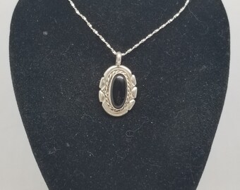 FA3029 Vintage Native Sterling and Onyx Pendant with a 20" Sterling Chain.