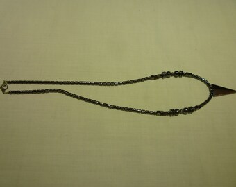 L65 Vintage Hematite Necklace with a Hematite Arrow Pendant.