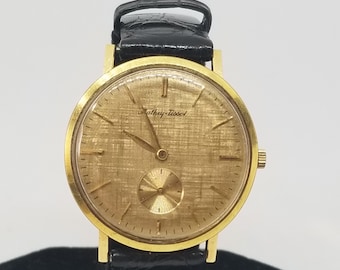 FARW247 18K Yellow Gold Swiss Mathey Tissot Wrist Watch, 17 Jewels with Black Band, Working.