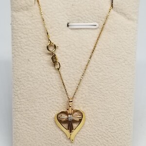 Z2444 Vintage 14K Two Tone Gold with Diamonds Heart & Cross Pendant on a 20" 14K Y.G. Chain.
