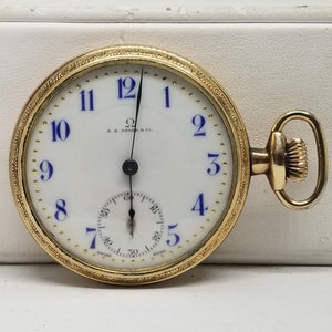 FAPW135 1912 Gold Filled Omega Pocket Watch, Size 40mm , 17 Jewels, Working but has Problems.