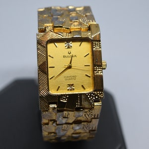 Bulova diamond quartz 18k gold sale