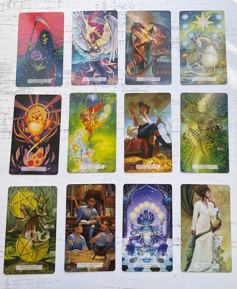 May include: A set of 10 tarot cards featuring colorful illustrations of various characters and symbols. The cards are arranged in two rows of five. The cards include Death, Temperance, The Tower, The Star, The Sun, Judgement, The World, Hope, Two of Pentacles, Three of Pentacles, Eight of Pentacles, Nine of Pentacles.
