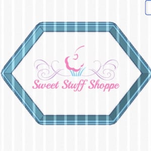 May include: A blue hexagonal frame with a white background and the text "Sweet Stuff Shoppe" in pink. A pink cupcake with a swirl of frosting and green grass is above the text.