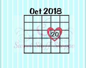 May include: A calendar grid with the month of October 2018 printed at the top. The 20th is highlighted with a red heart.
