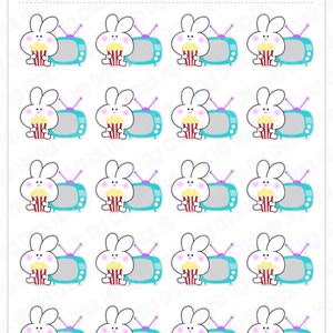 Op de afbeelding: Een vel met 15 stickers met een cartoonkonijn dat televisie kijkt met een emmer popcorn. De stickers zijn wit met roze accenten en de tekst "Hip Digi Chick" en "TV / Binge" staat bovenaan het vel. De tekst "BEA104" staat in de rechterbovenhoek.